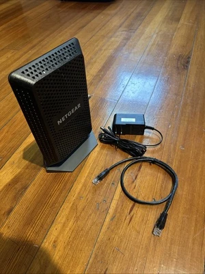 Módem de cable multi-gig NETGEAR CM1100 DOCSIS 3.1 con cable de alimentación probado funcionando Foto 1 de 4