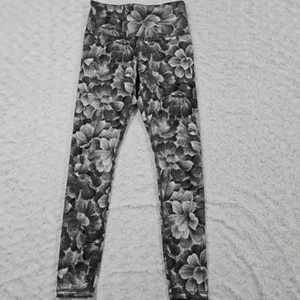 Athleta Elation blanco y negro floral texturizado ajustado para mujer XS Entrenamiento Yoga - Imagen 1 de 8