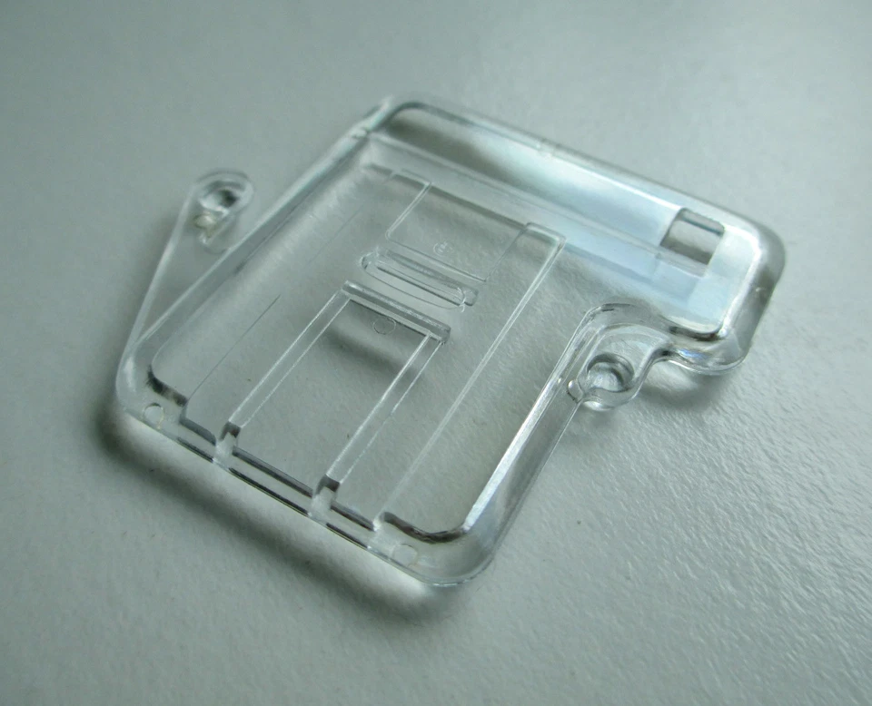 SINGER Sewing Machine Plastic Feed Dog Cover Plate 313117