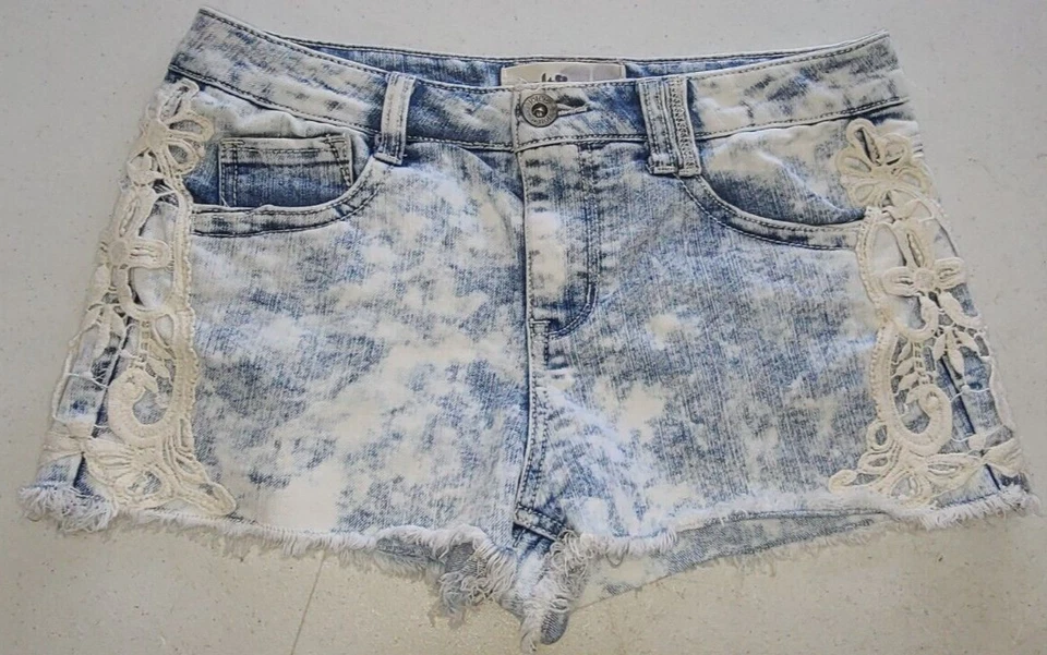 Pantalones de mezclilla azul lavado ácido talla 7 (32x2) Jolt Junior patrón de encaje en el lateral Foto 1 de 4