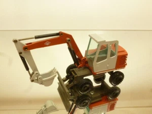 NZG MODELLE 258 O&K MHZ WHEELED EXCAVATOR - 1:50 - GOOD CONDITION - Imagen 1 de 6