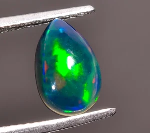 AAA Quality Black Opal Pear Shape Fire Play Cabochon Gemstone 10X6X3 mm 1.05 Ct - Picture 1 of 3