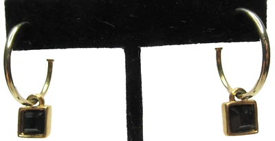 Pendientes perforados de aro dorado de cristal negro GIVENCHY Foto 1 de 4