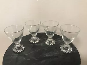 LOT OF 4 VINTAGE CLEAR GLASS FOOTED DESERT JUICE GLASSES - 4 INCHES TALL - Picture 1 of 5