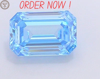 1.00 ct Emerald Cut IGI Diamond Engagement Ring Fancy Vivid Blue Color VS1 - Image 1 of 4