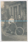C024532 Two Women with a Bicycle are standing in front of the House. 1909