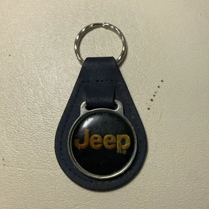 Llavero vintage negro naranja Jeep cuero negro cromo 1996 - Imagen 1 de 4