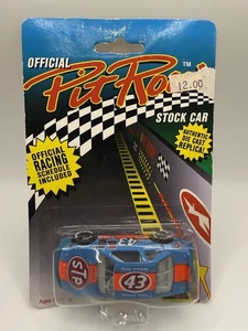 NASCAR Pit Row 1:64 Die Cast Stock Car - Richard Petty #43 STP Pontiac - Bild 1 von 2