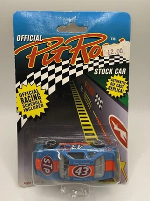 NASCAR Pit Row 1:64 Die Cast Stock Car - Richard Petty #43 STP Pontiac - Image 1 of 2