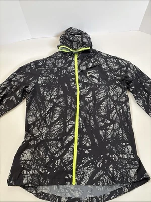 Chaqueta Nike Mujer Mediana Negra ENCANTADA Imposiblemente Ligera Chaqueta para Correr 685927 Foto 1 de 4