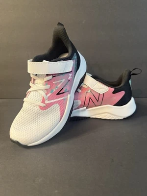 Zapatillas New Balance Rave Run Niñas v2 Niños Talla 3 en Blanco/Rosa/Negro YTRAVFP2 Foto 1 de 4