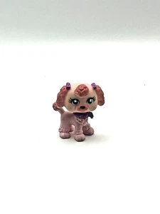 Figura de perro cachorro Mattel con ojos brillantes Polly Pocket caniche rosa con ojos brillantes - Imagen 1 de 10