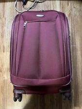 Red Samsonite suitcase used good condition four wheels 24x15 X11 clean
