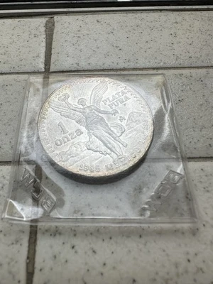 1985 Mexican Libertard 1 Ozna Silver Coin Toner.999 Silver - Image 1 of 2
