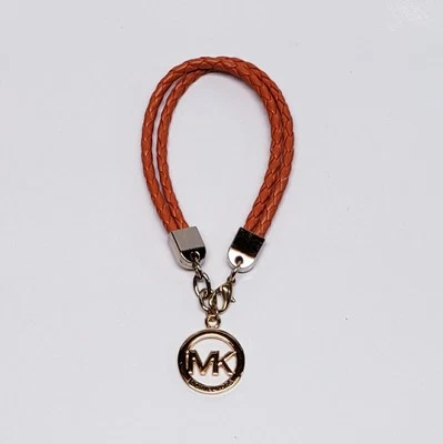 Michael Kors Bolso Pulsera Doble Trenzado Cuero Naranja Etiqueta con Logo Dorado Dije Foto 1 de 3