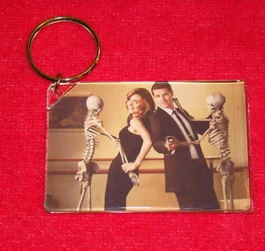 PORTACHIAVI OSSA David Boreanaz & Emily Deschanel - Foto 1 di 1