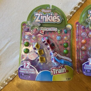 NEW SEALED SQUINKIES ZINKIES TRAIN SET FIGURES PETS 12 PCS BLIP NIB 2012 - Picture 1 of 2