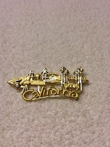 BROCHE DE COLECCIÓN DE DISEÑO DANCRAFT AÑOS 80 TONO DORADO CALIFERIA. - Imagen 1 de 4