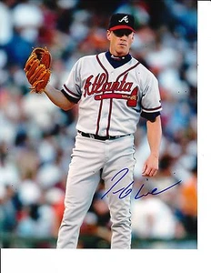 ATLANTA BRAVES TOM GLAVINE SIGNED GETTING BALL BACK 8X10 - Picture 1 of 1
