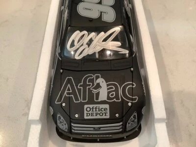 CARL EDWARDS AUTOGRAPHED 2008 FORD FUSION AFLAC BLACK LABEL COT DIECAST & CARD - Image 1 of 4