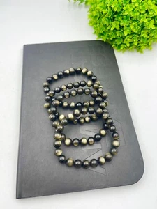 Pulsera de cuentas redondas de obsidiana dorada natural calidad AAA para hombre y mujer - Imagen 1 de 14