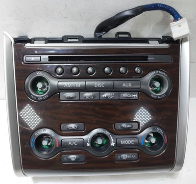 Radio controles de clima para tablero central Nissan Pathfinder 2013-2016 grano de madera marrón Foto 1 de 4