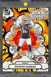 Shedeur Sanders SELTENE ROOKIE BOMB SQUAD INVESTMENTKARTE BROWNS PANINI NEUWERTIG - Bild 1 von 5