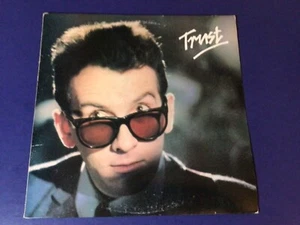 ELVIS COSTELLO AND THE ATTRACTIONS~trust COLUMBIA 1981 ~ (LP) Nm / (JACKET) Vg++ - Imagen 1 de 7