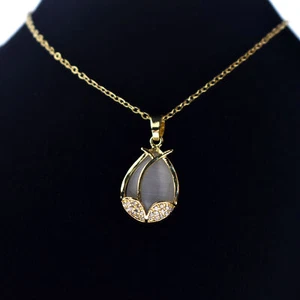 Collana con ciondolo fiore in cristallo placcato oro per donna, collana fiore - Foto 1 di 5