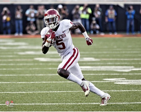 Marquise Brown Oklahoma Sooners Unsigned White Jersey Running Photograph Cover