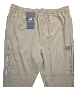 NEW BALANCE All Motion JOGGERS Mens Running Vented Pants Beige Size M - Picture 1 of 9
