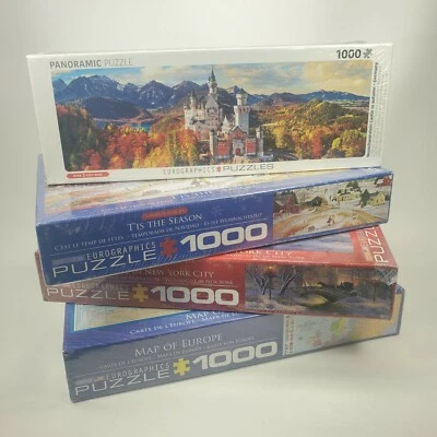 LOT of FOUR (4) EUROGRAPHICS 1000 Piece Jigsaw Puzzles Christmas Season Europe - Image 1 of 4