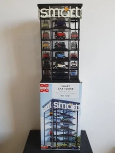Busch 1001 Smart Car Tower mit 22 Smart Modell Fahrzeuge Bausatz H0 1:87 Neu OVP - Bild 1 von 15