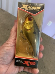 Xcalibur XR100 Gold/ Black 1 OZ Fishing Lure NEW See Pics For Details - Picture 1 of 6