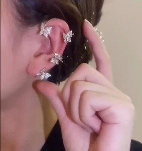 PENDIENTE DE PUÑO CON CLIP DE MARIPOSA OREJA IZQUIERDA - Imagen 1 de 3