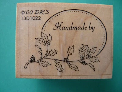 Hecho a mano por etiqueta con delicadas estampillas de goma florales Foto 1 de 2