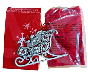 Trineo adorno de Navidad de peltre Avon 2007 - Imagen 1 de 8