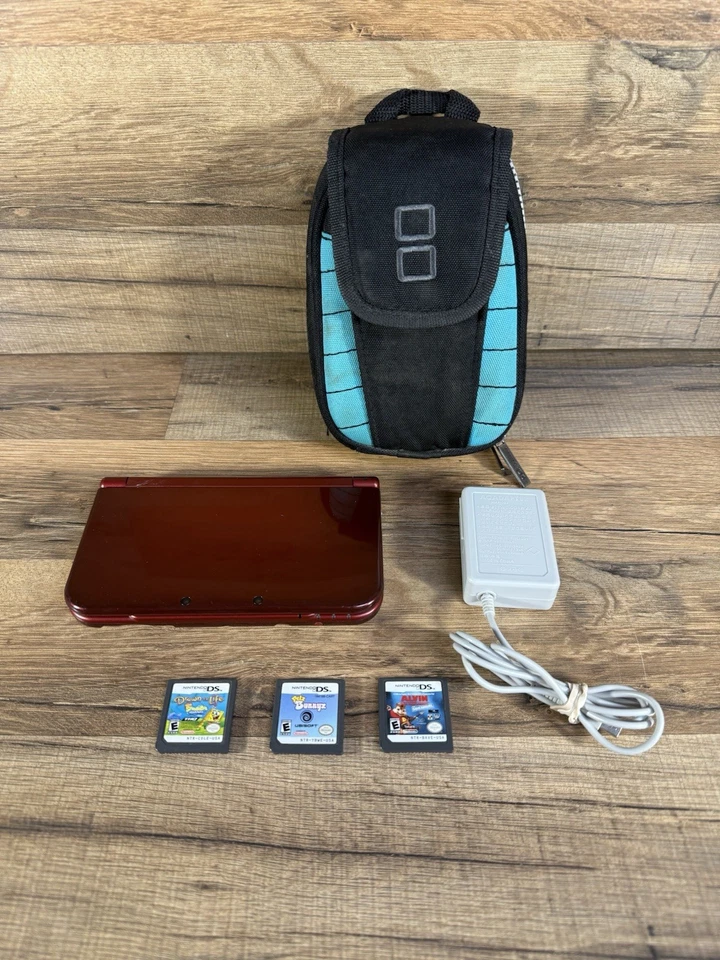 Consola Nintendo NUEVA 3DS LL XL Roja Metálica con Cargador, Juegos y Estuche - Probada Foto 1 de 4
