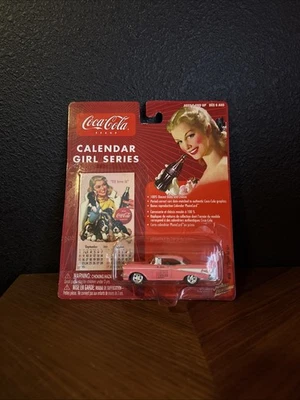 Johnny Lightning Coca Cola Calendar Girl Series #10 1957 Chevy Bel Air Pink 1/64 - Image 1 of 2