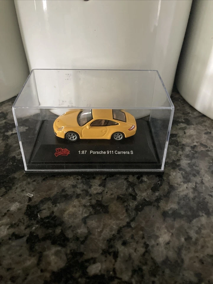 Porsche 911 Carrera S Coupe Atlas WELLY Collection amarelo - Escala HO - 1/87 - Imagem 1 de 1