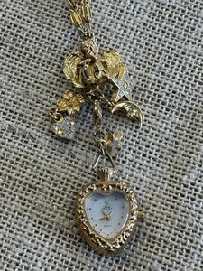 Collar Kirks Folly vintage con reloj (necesita batería), ángel, luna, estrellas - Imagen 1 de 5