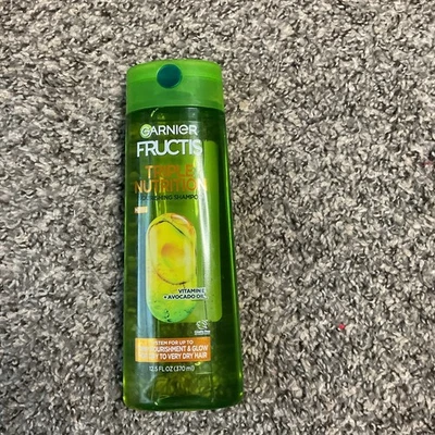 Aceite de aguacate Garnier Fructis Triple Nutrition vitamina E 12,5 FL oz Foto 1 de 3