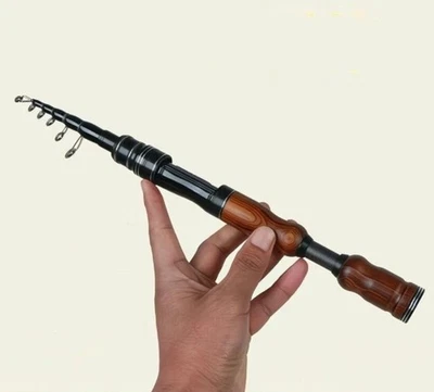 Cañas de pescar telescópicas caña de corriente de fibra de carbono caña giratoria de fundición ultraligera Foto 1 de 4