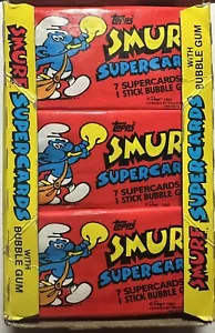 1982 SCHLUMPF SUPERCARDS PACK UNGEÖFFNETE WACHSPACKUNG - Bild 1 von 3