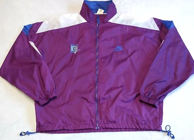 Chaqueta cortavientos vintage Nike XL cremallera completa años 90 NCAA multicolor púrpura rara Foto 1 de 4