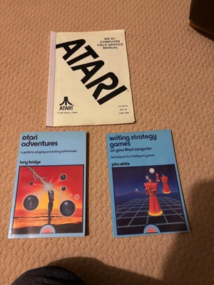 Vintage Atari books  incl Atari Adventures and 800XL Field  Service manual - Image 1 of 3