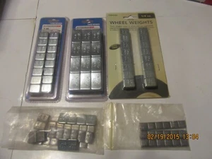 A collection of assorted wheel weights. 1/8, i/4, 1/2 oz. - Picture 1 of 4