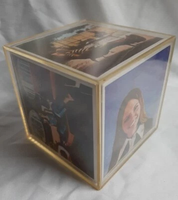 Cubo de fotos vintage años 70 con imágenes publicitarias originales Foto 1 de 4