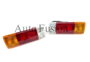 Tail Lights Pair For Toyota Landcruiser 70 Series Trayback (1985-2007) - Picture 1 of 1