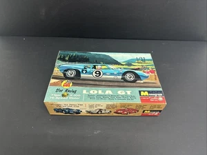 MONOGRAMA VINTAGE ESCALA 1/32 CARRERAS LOLA GT SLOT CAR 1965 ORIGINAL solo caja - Imagen 1 de 6